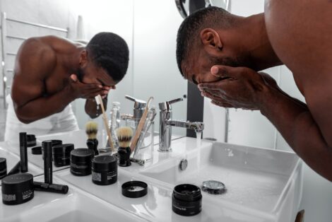 how to apply cologne, man washing his face,